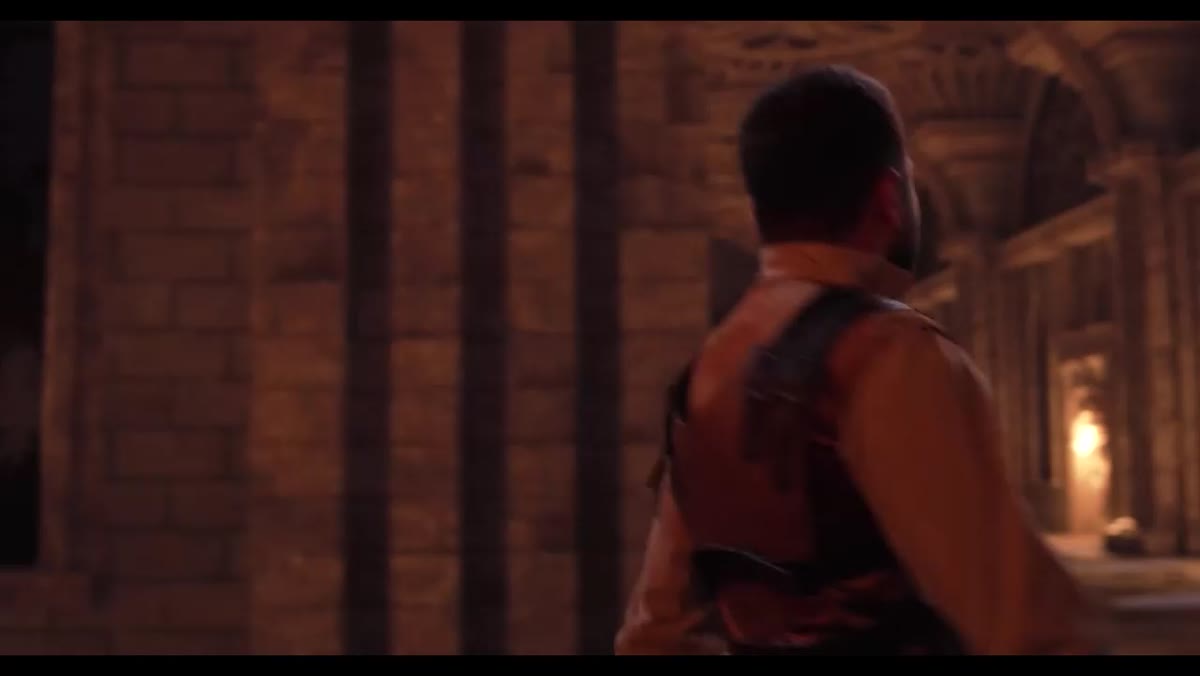 A performer in the warmly lit castle scene