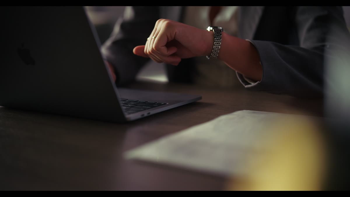 A watch and laptop in the OLEVS spec film
